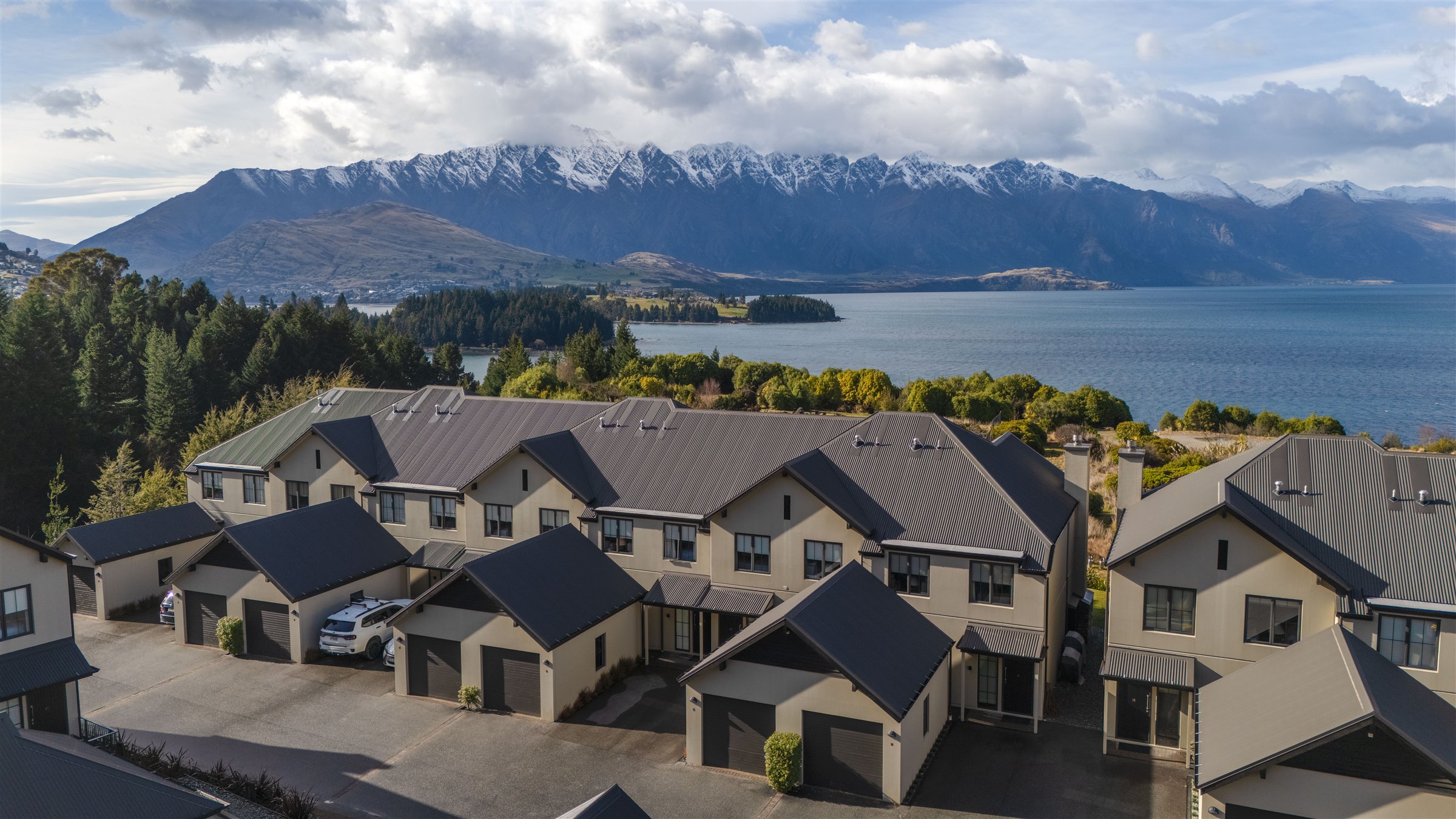 Platinum Luxury Villas with Lake Wakatipu and The Remarkables behind them