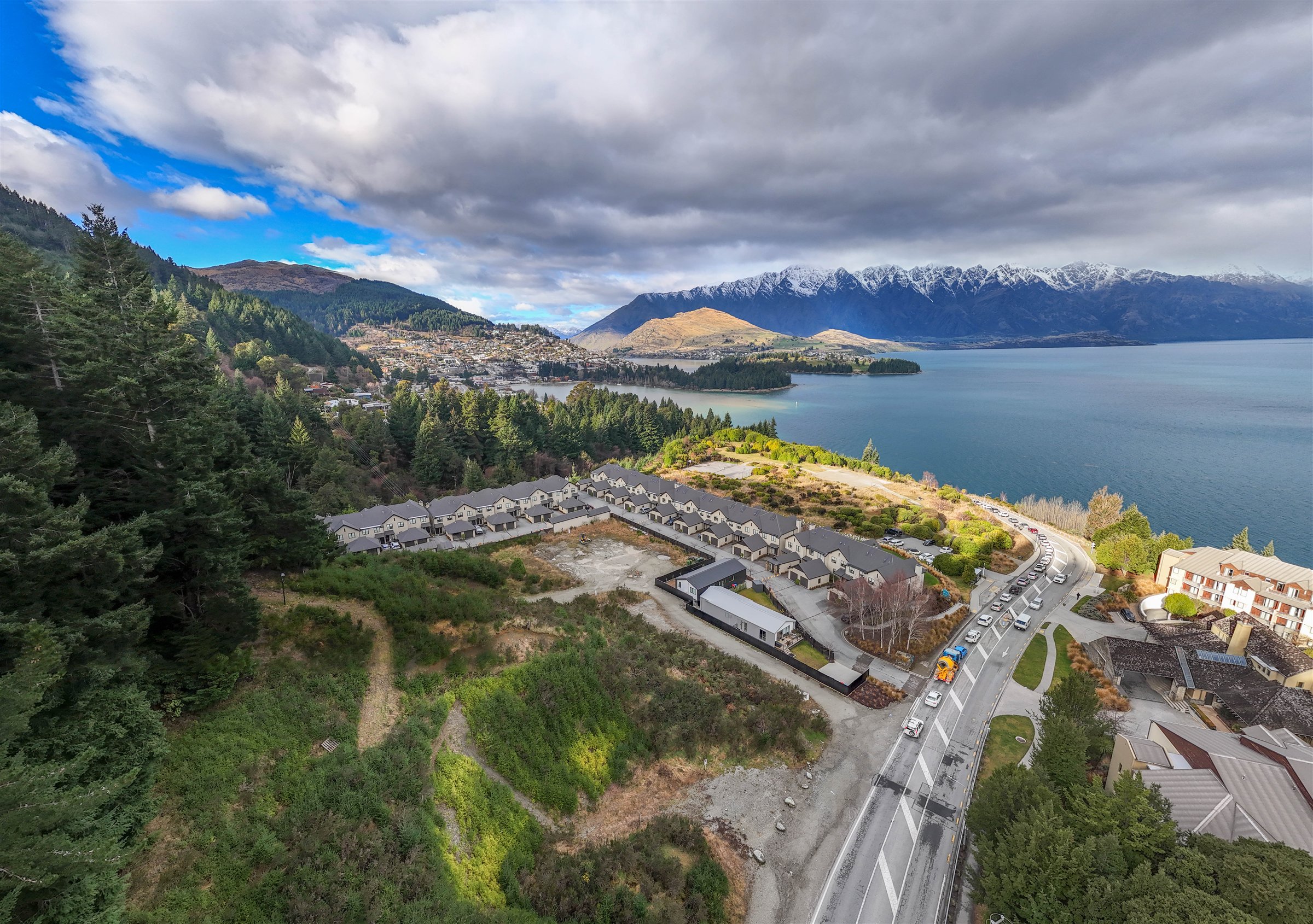 Queenstown and Lake Wakatipu under changing winter clouds
