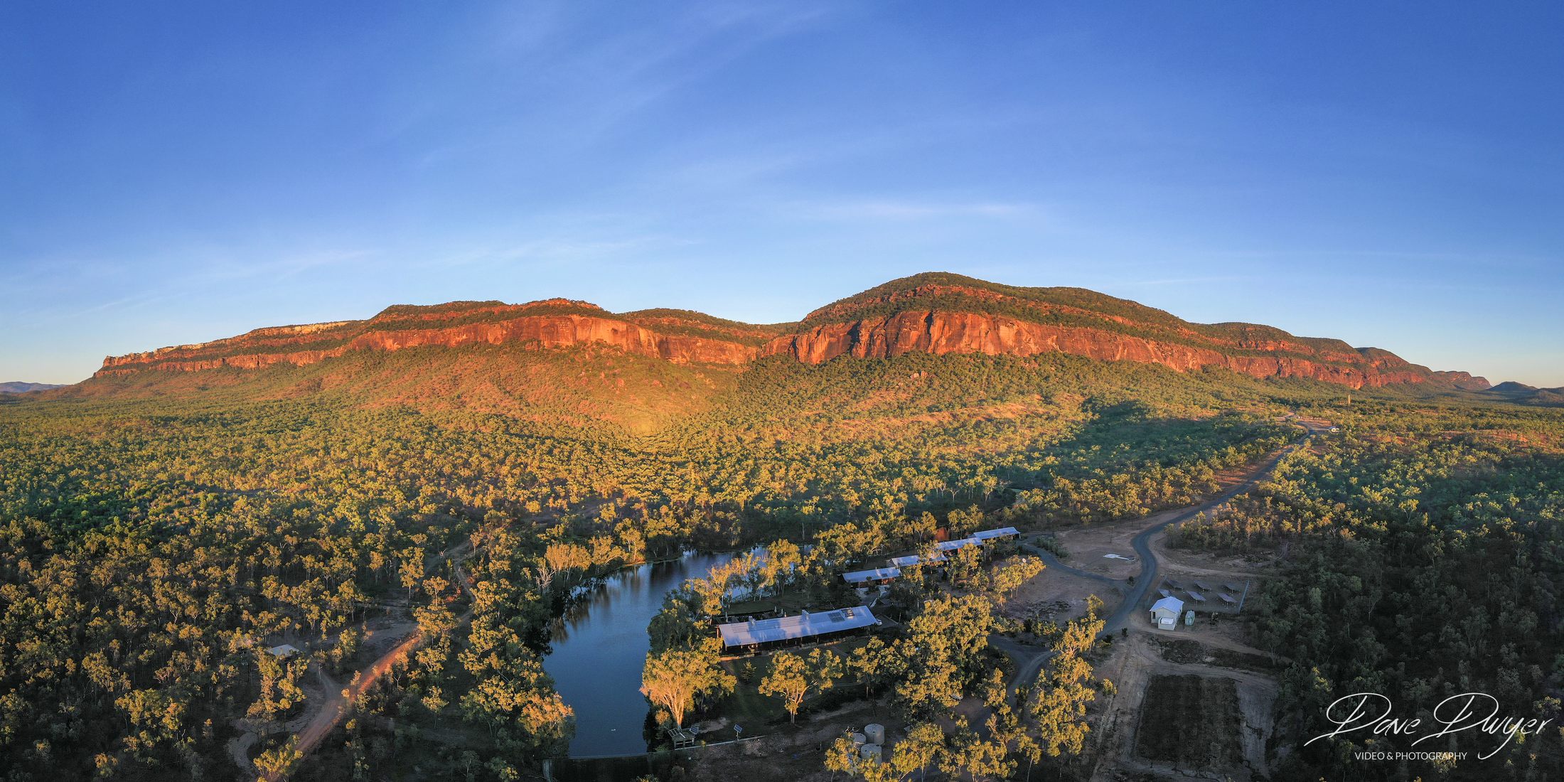 Aerial landscape of a Queensland escarpment in golden-hour light