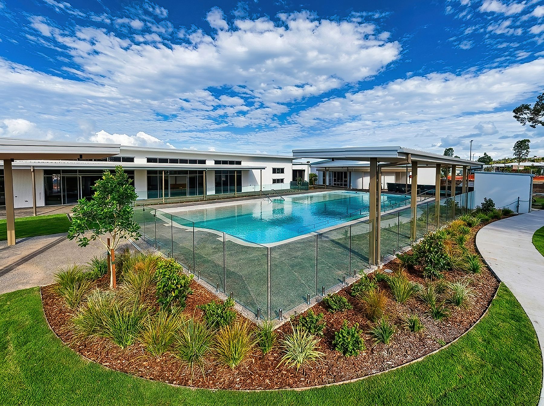 Vantage Hervey Bay Clubhouse pool and architecture during the day
