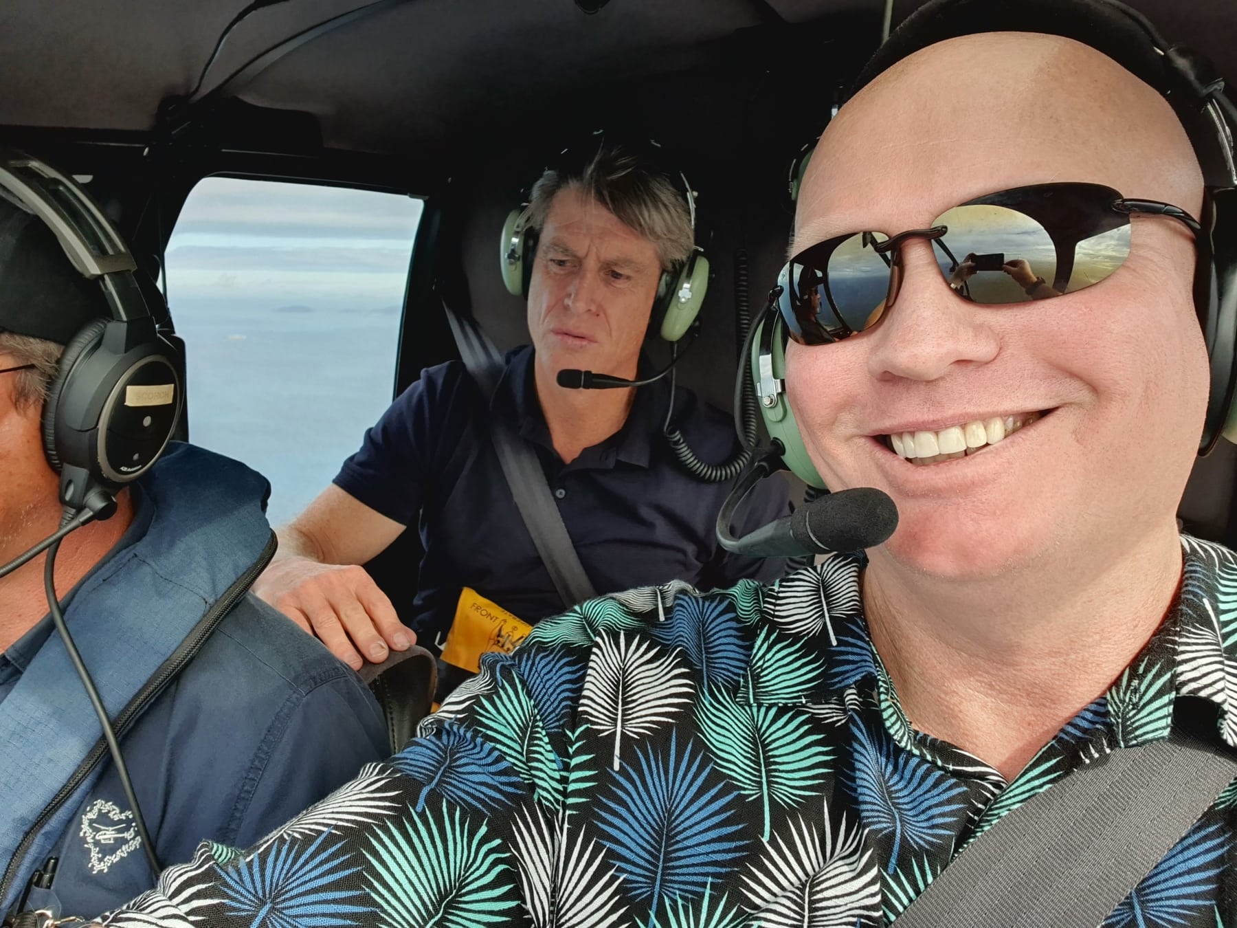 Dave and the production team in a helicopter